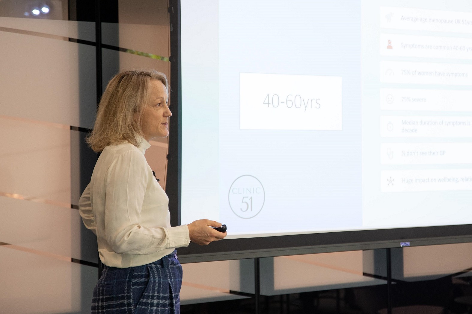 Older woman leading meeting